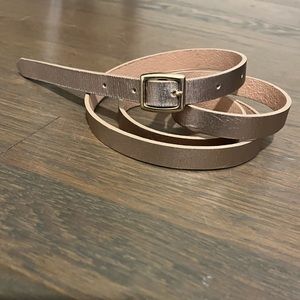 Women’s skinny gold metallic belt